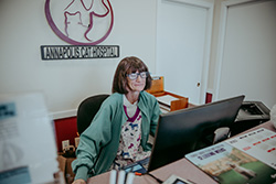 Technician, Mary,  welcoming new clients to our hospital.